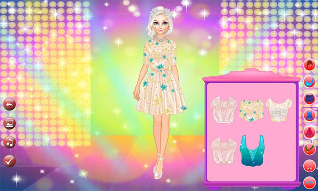 Thay đồ cho Nữ hoàng băng giá Elsa để chuẩn bị cho bữa tiệc Hoàng gia