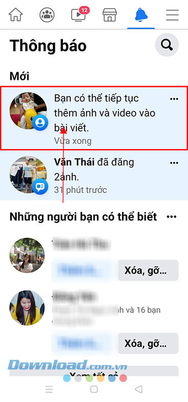 Nhấn vào thông báo "Bạn có thể tiếp tục thêm ảnh và video vào bài viết"
