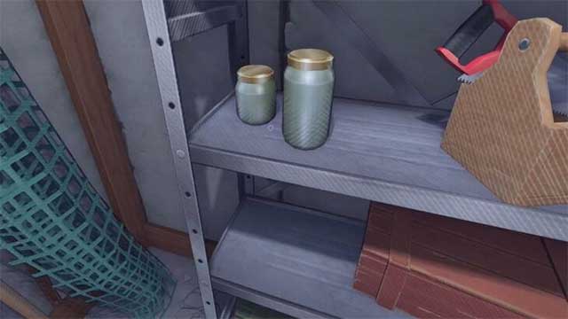 Trên kệ trong phòng có một Player Cartridge