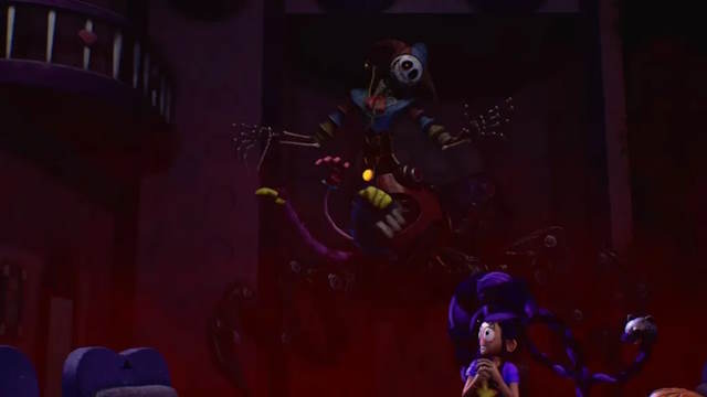 Hình dạng của The Prototype được tiết lộ rõ hơn: một con nhện máy với đầu chú hề